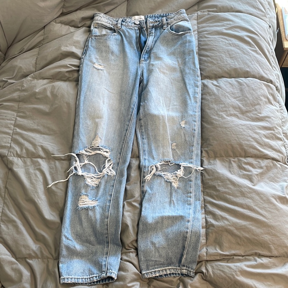 Ripped light-wash denim jeans
